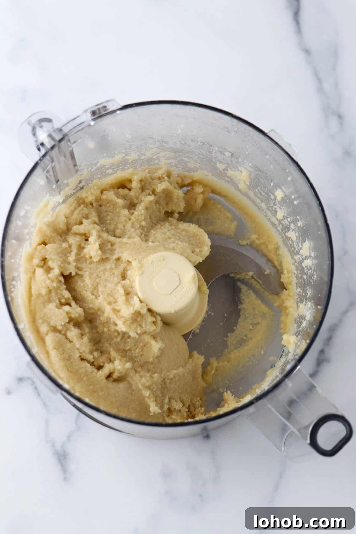 Almond Macaroon dough in a food processor.