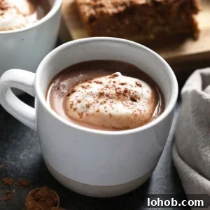 Vegan Chai Hot Chocolate Recipe: Creamy Spiced Cocoa Mix 2 vegan chai hot chocolate in a mug