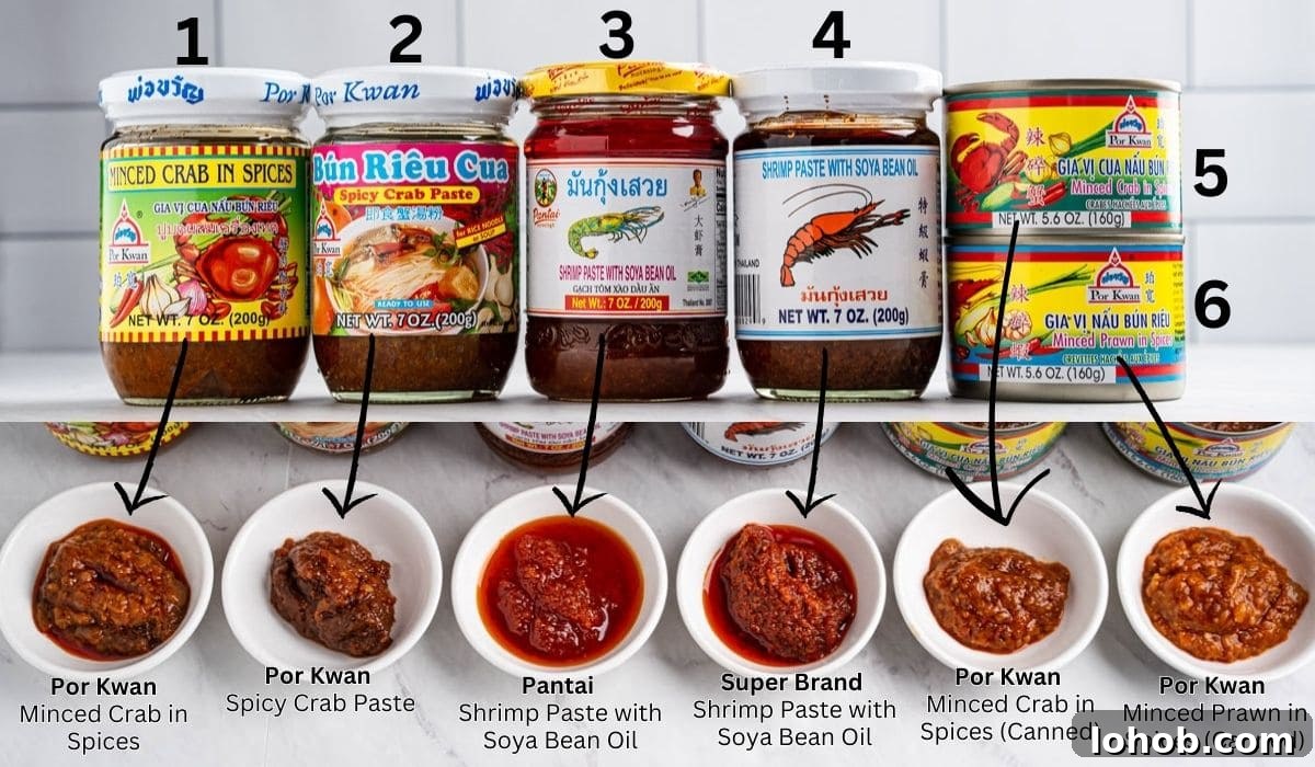 Jars and cans of crab paste and shrimp paste, small individual bowls of each paste underneath and labeled.