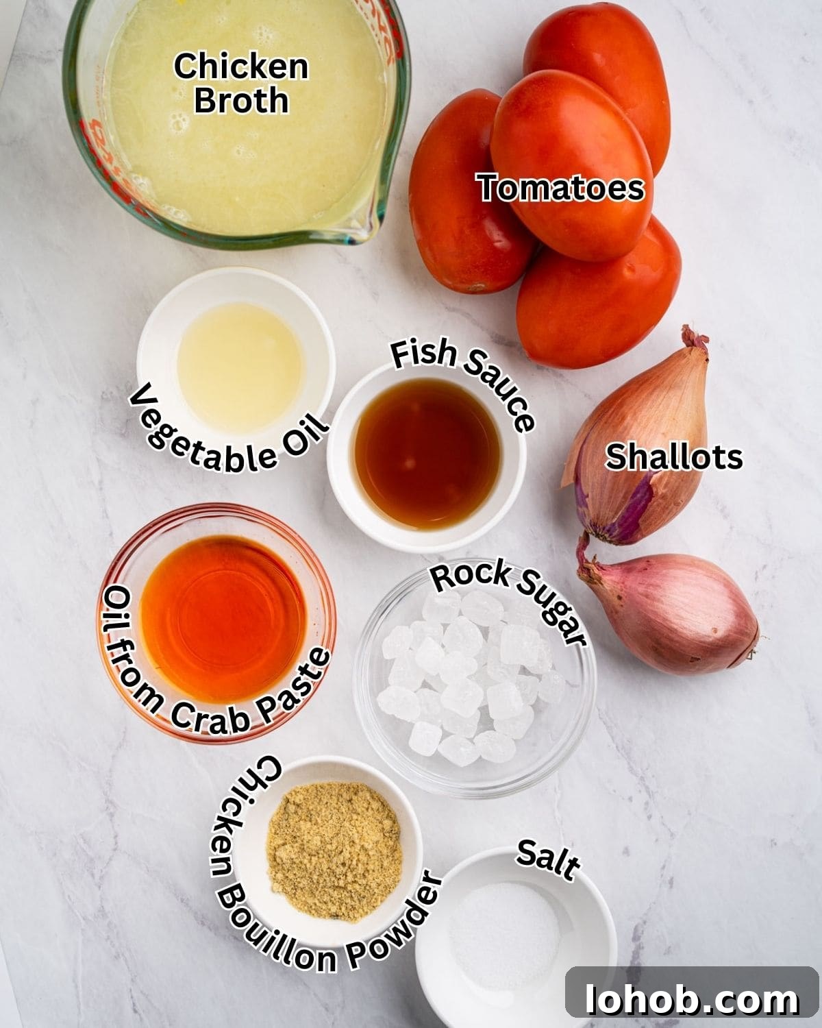 Ingredients for broth: chicken broth, tomatoes, shallots, vegetable oil, crab paste oil, fish sauce, rock sugar, chicken bouillon powder, and salt.