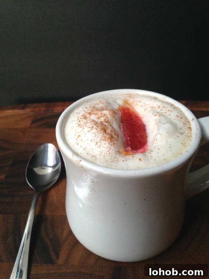 Blood Orange Chai Tea Latte Recipe - An easy and dairy-free drink made with chai tea, fresh blood orange juice, and vanilla. A sweet and spicy beverage to warm you up this winter! | @sinfulnutrition | #sinfulnutrition | #veganchaitealatte | #dairyfreechailatte | #homemadechailatte