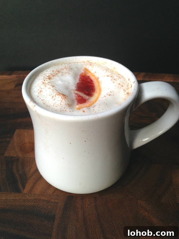Blood Orange Chai Tea Latte - Made with chai tea, fresh blood orange juice, and vanilla for a sweet and spicy drink to warm you up this winter!