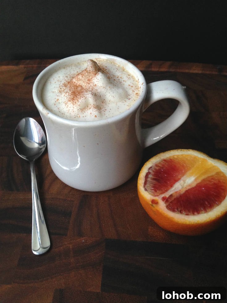 Blood Orange Chai Tea Latte Recipe - An easy and dairy-free drink made with chai tea, fresh blood orange juice, and vanilla. A sweet and spicy beverage to warm you up this winter! | @sinfulnutrition | #sinfulnutrition | #veganchaitealatte | #dairyfreechailatte | #homemadechailatte