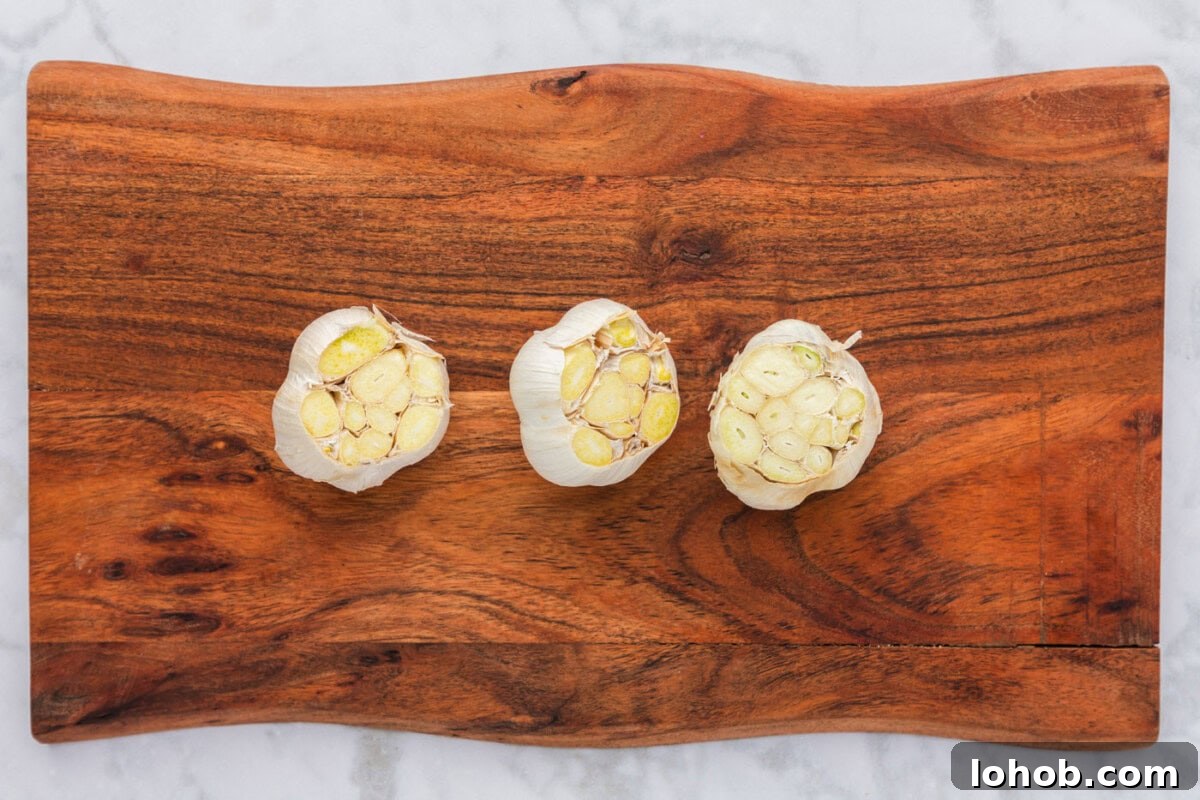 garlic bulbs with the tips sliced off
