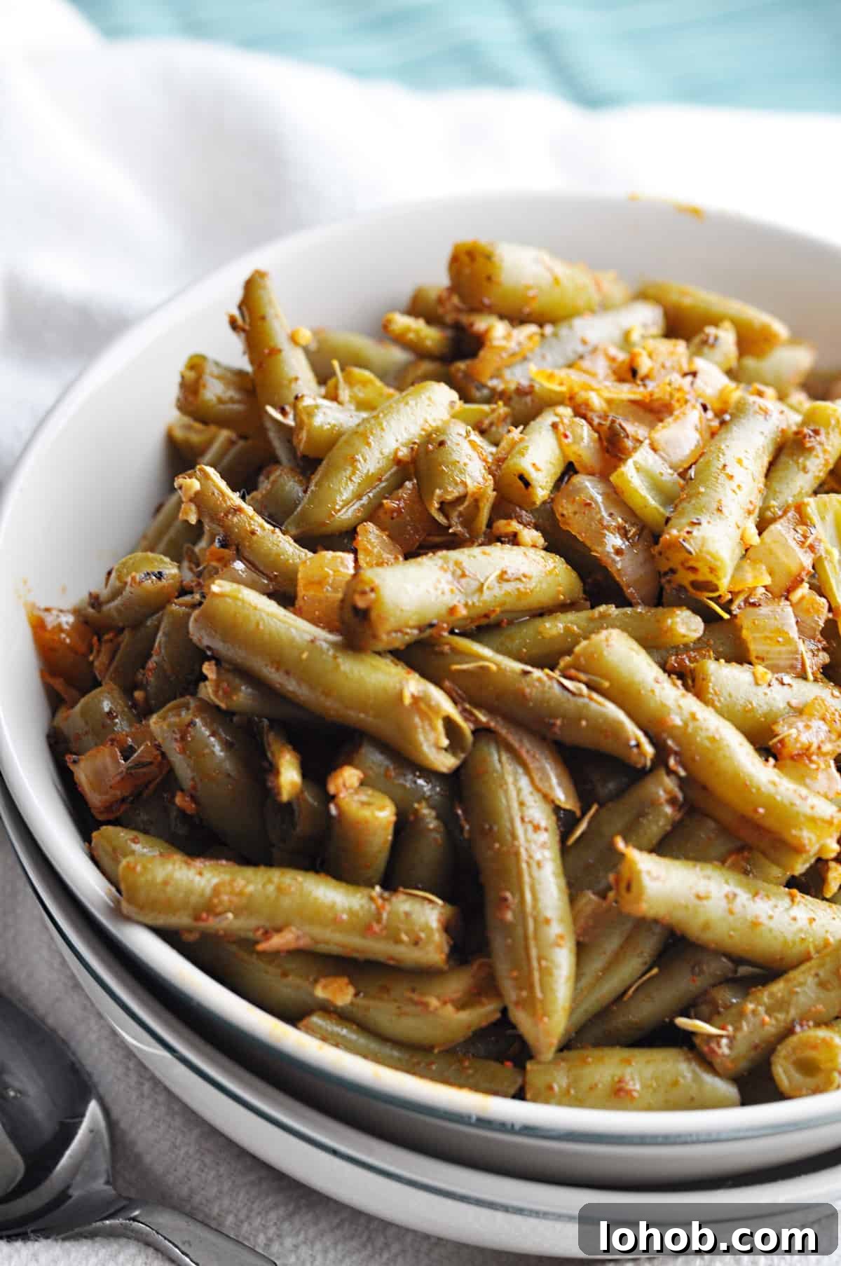 Cajun spiced green beans in bowl ready to eat.