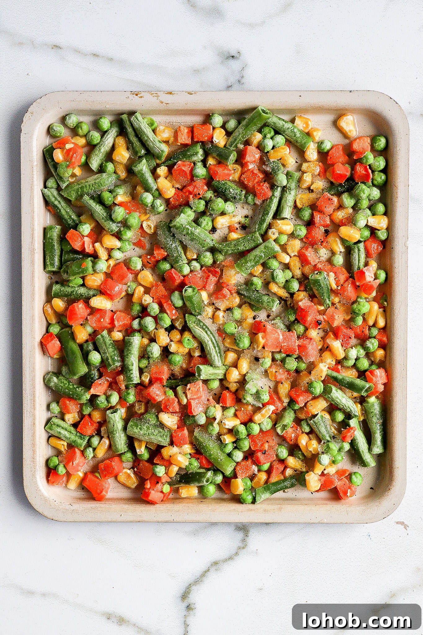 Air Fryer Frozen Vegetables: Quick Crispy Recipe 5 top down view of vegetables in the air fryer