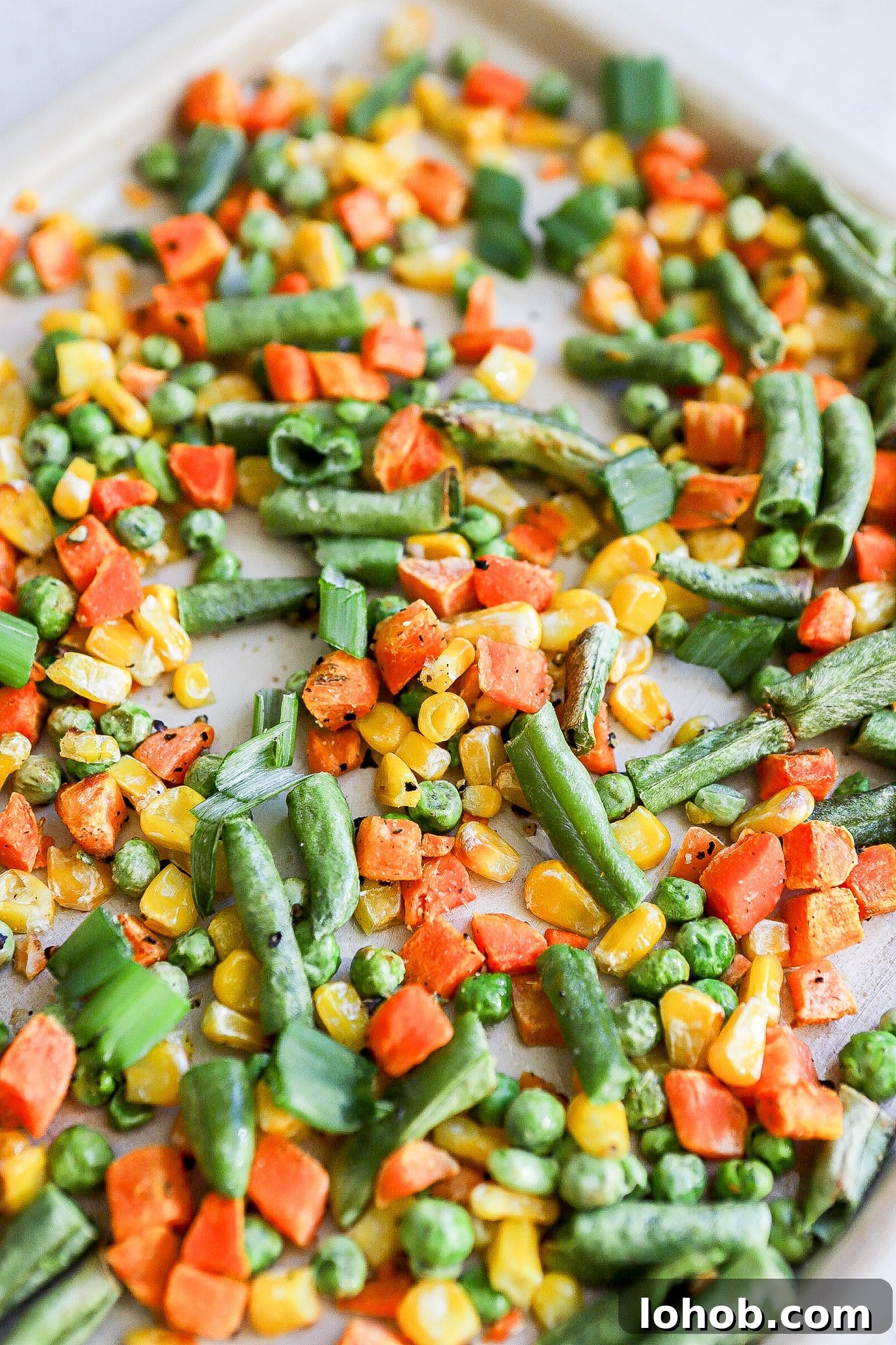 Air Fryer Frozen Vegetables: Quick Crispy Recipe 6 side view of frozen vegetables on air fryer tray