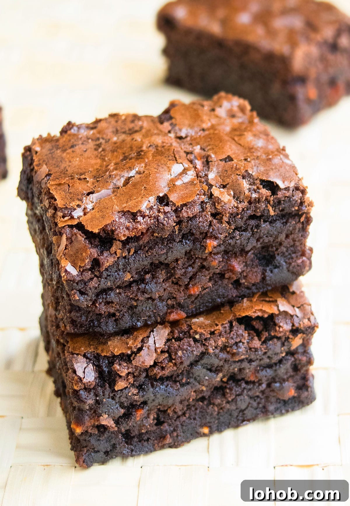 Fudgy Carrot Brownies from a Box Mix 2 Stack of Easy Carrot Brownies With Box Mix on Wood Background.