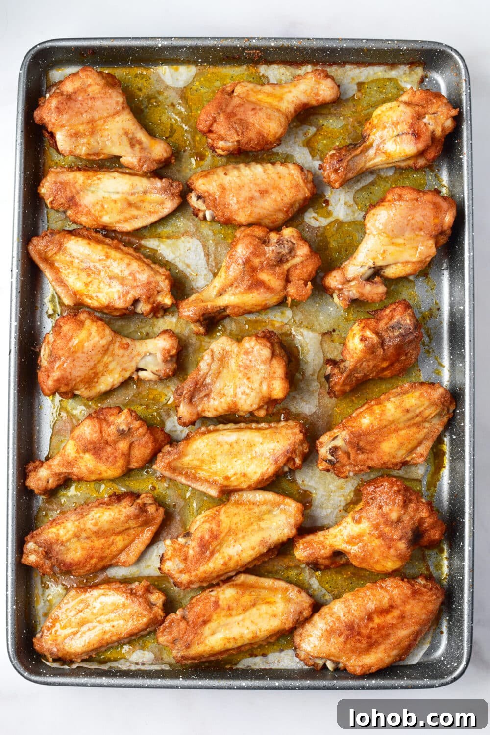 Crispy Baked Buffalo Wings Recipe 9 chicken wings ready to be flipped