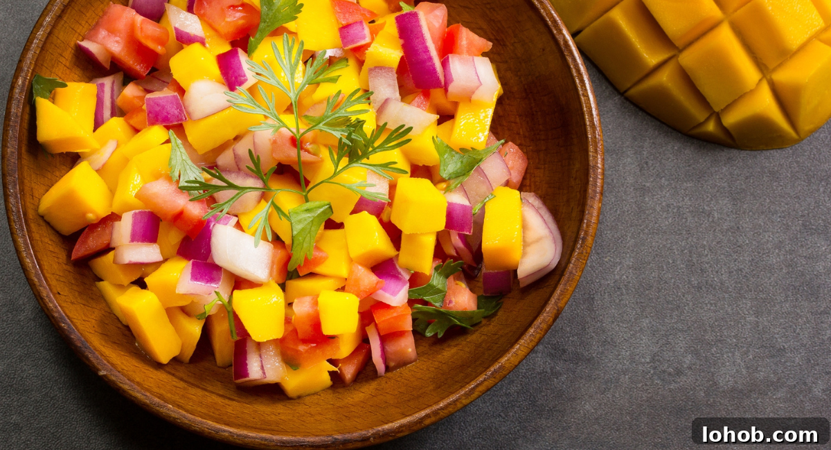 20 Simple Fish Taco Toppings to Elevate Flavor 3 Overhead image of mango salsa.