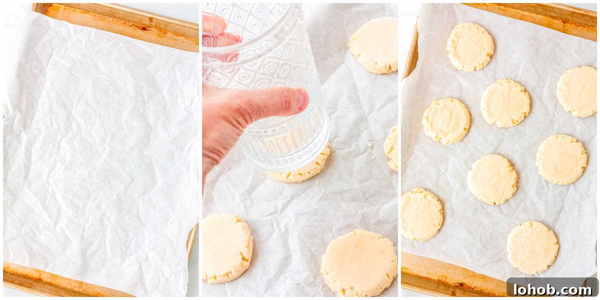 The baking sheet lined with parchment, the cookie dough pressed out, and then baked.