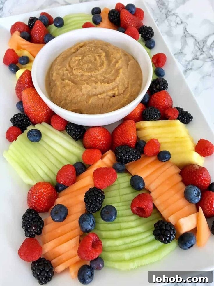 Sweet hummus fruit dip photo