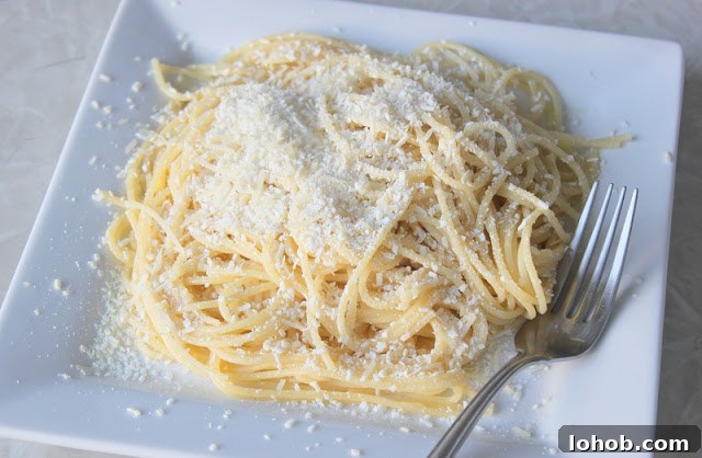 pasta with cheese and butter on white plate